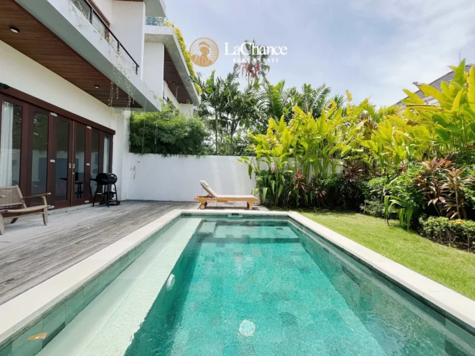 Brand new 3 bedroom modern villa for rent in Pererenan, Bali. Rooftop terrace, swimming pool, enclosed living room, premium kitchen.