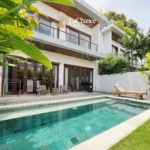 Brand new 3 bedroom modern villa for rent in Pererenan, Bali. Rooftop terrace, swimming pool, enclosed living room, premium kitchen.