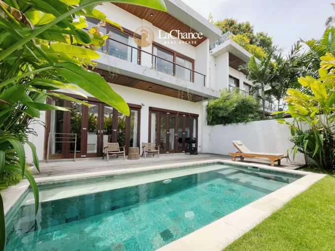 Brand new 3 bedroom modern villa for rent in Pererenan, Bali. Rooftop terrace, swimming pool, enclosed living room, premium kitchen.