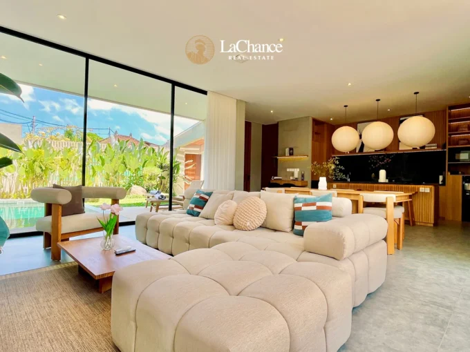 beautiful enclosed living room with high end material and swimming pool view