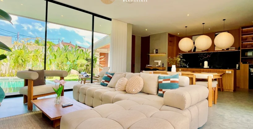 beautiful enclosed living room with high end material and swimming pool view